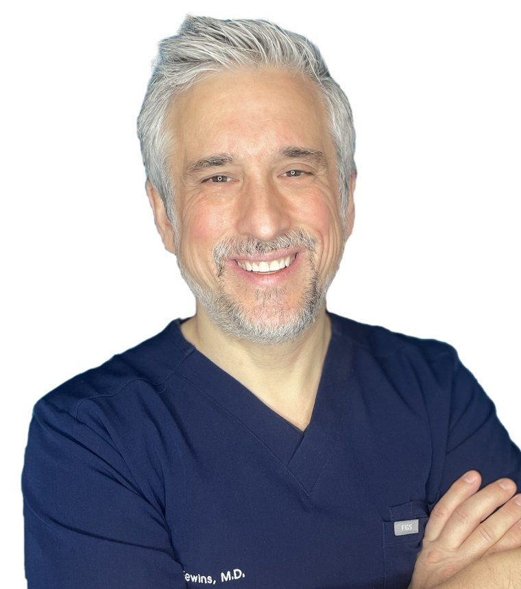 Portrait of Dr. John L. Fewins, MD, FACS