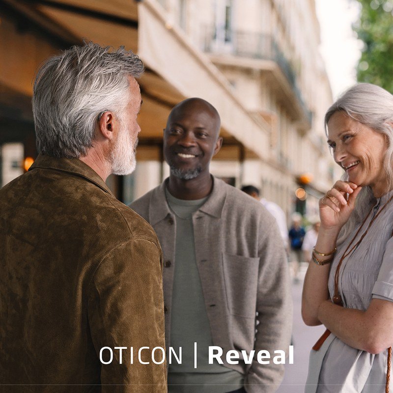 Oticon Reveal manufacturer image showing people in a social setting